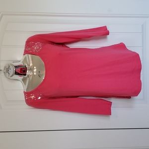 So: Bright pink top with lace back. Juniors size Large